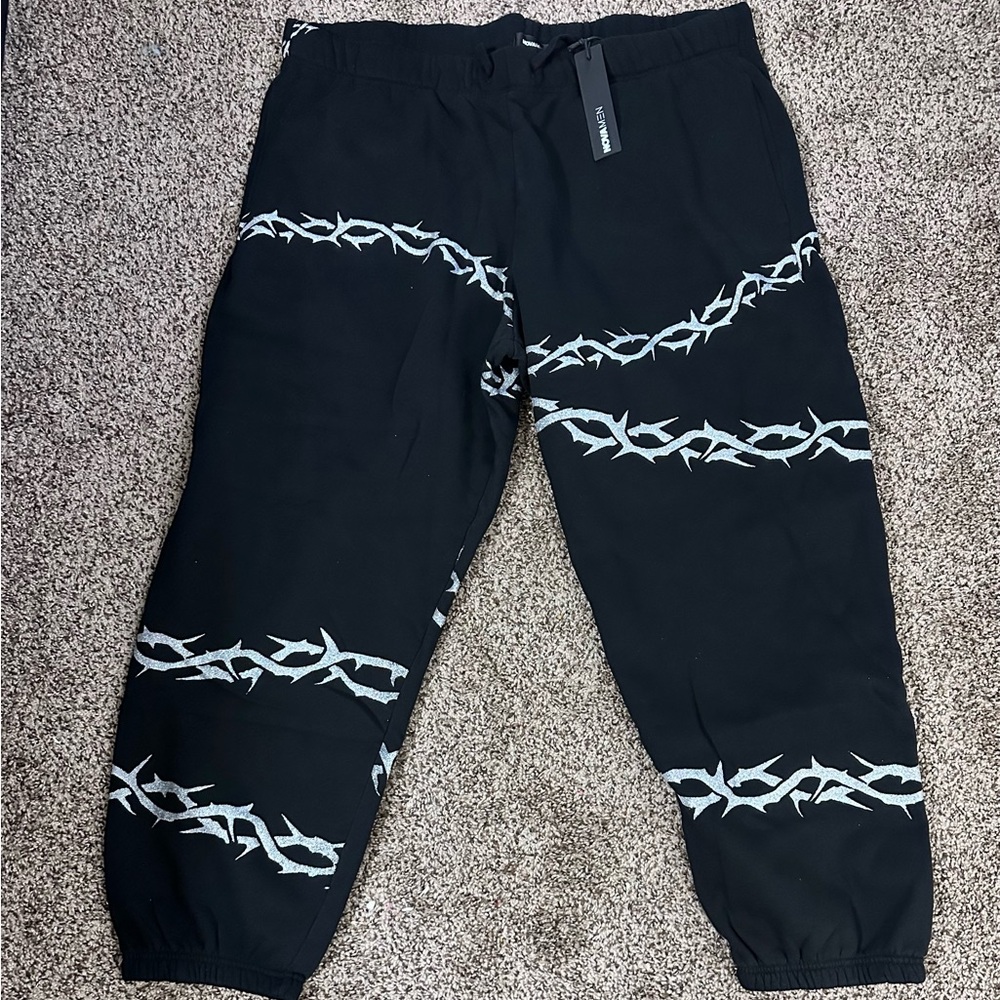 Black Joggers with White Thorn Design